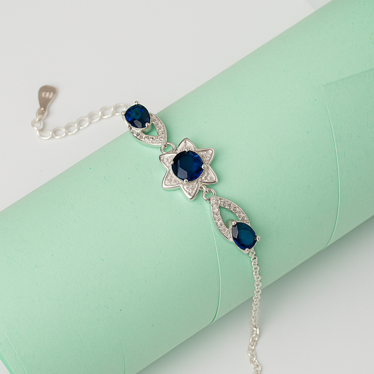 ZWB0133 – Sterling Silver Bracelet with Sapphire Blue Star Center & Navette Crystals