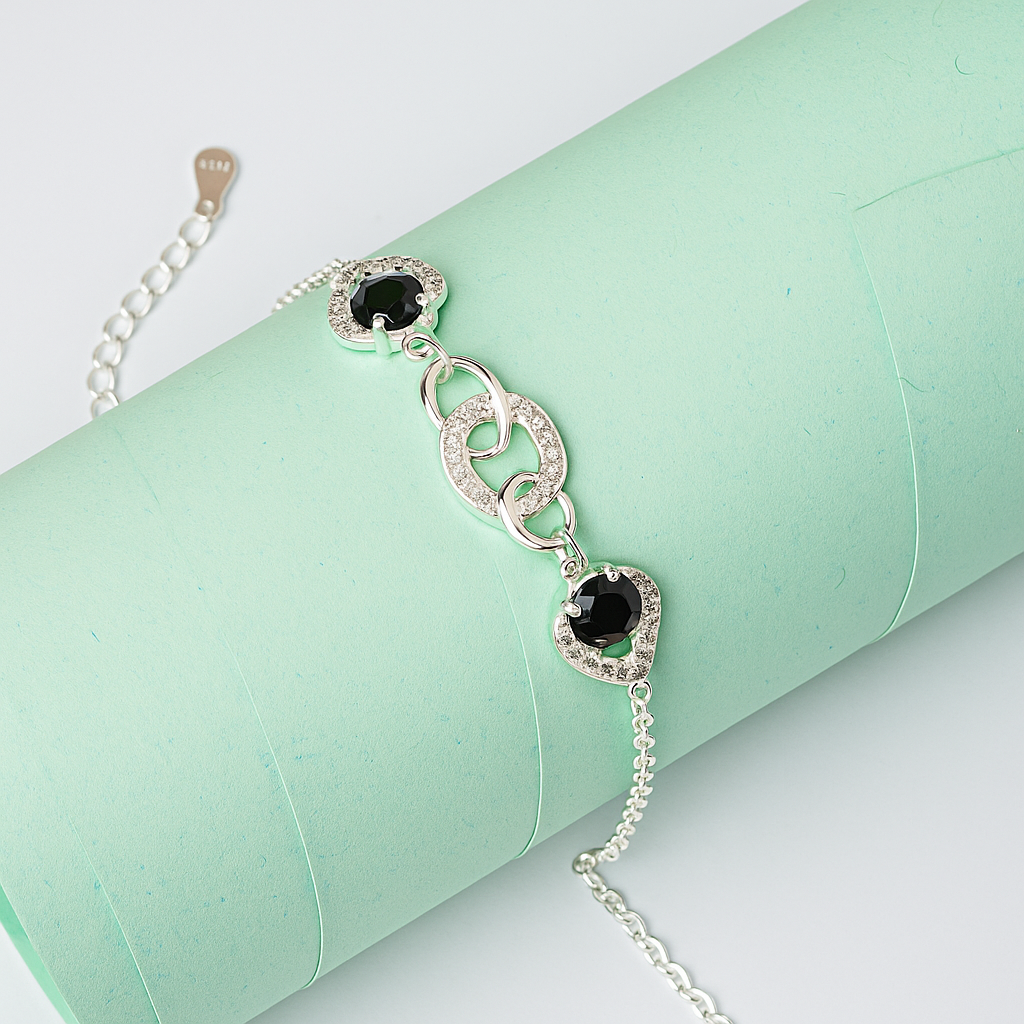 ZWB0134 – Sterling Silver Bracelet with Interlinked Loops & Pavé Heart Crystals in Black