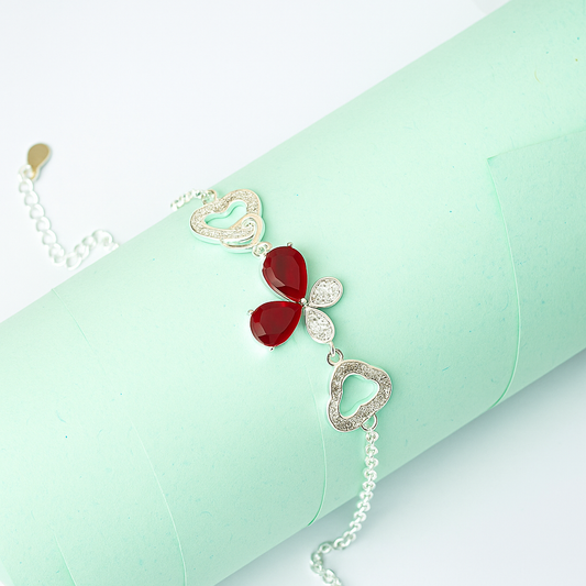 ZWB0135 – Sterling Silver Bracelet with Red Butterfly Center & Crystal-Embellished Heart Links
