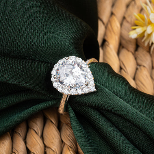 ZWR0137 – Sterling Silver Pear-Cut Halo Ring with Brilliant White Center Stone