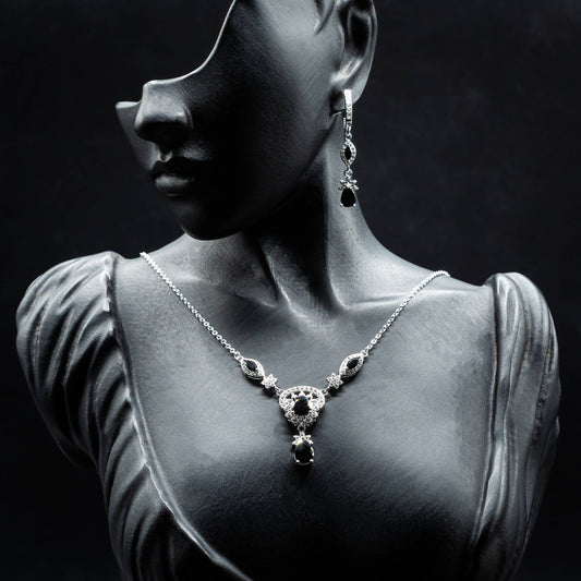 ZWS0154 – Sterling Silver Set with Jet Black Marquise & Teardrop Crystals in Floral Halo Design