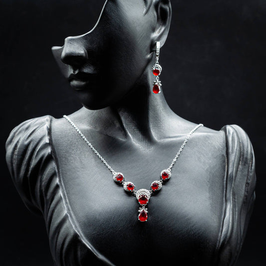 ZWS0155 – Sterling Silver 4-Piece Set with Crescent Halo Ruby Red Crystals & Teardrop Charms